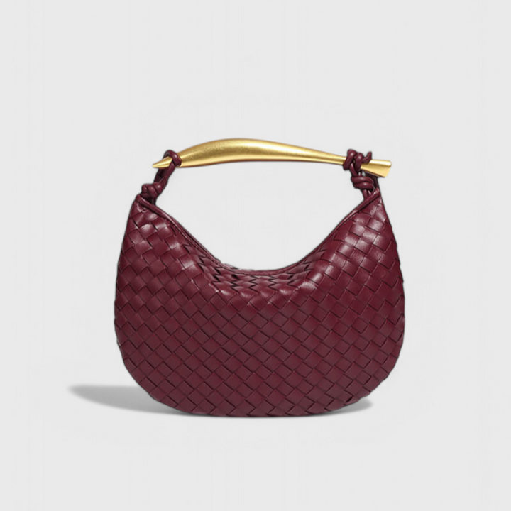 Bolso Elora Trenzado con Asa Escultural Dorada