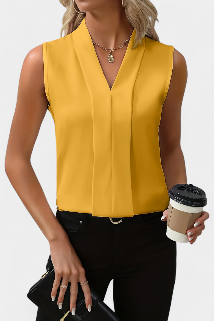 Blusa Vega – Elegancia atemporal sin mangas